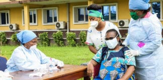 A pregnant woman in the Democratic Republic of the Congo is cared for by midwives as the COVID-19 pandemic continues to spread across Africa.