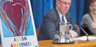 Photo of press conference in 2012 on UN stamps issued to commemorate World Autism Day. UN Photo/Mark Garten