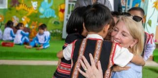 UNICEF Executive Director Catherine Russell is greeted by children at a pre-school in Viet Nam, where UNICEF supports early childhood development. Photo:©UNICEF/Truong Viet Hung