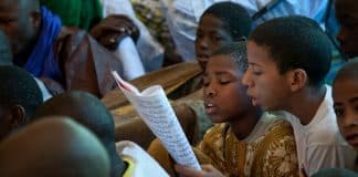 UN Photo/Marco Dormino Children reading a panegyric during a festival in Timbuktu, Mali.