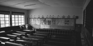 Photo of empty classroom, by Mwesigwa Joel on Unsplash