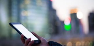 Person holding a mobile phone