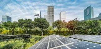 Solar panels and city backdrop, Climate Smart Cities Challenge