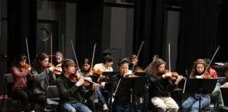 The UN Messenger of Peace, violinist Midori performing with young students from the Conservatory and the Afghan Youth Orchestra