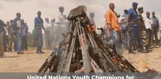 Weapons burning in Burundi - banner promoting the UN Youth Champions for Disarmament Training Programme
