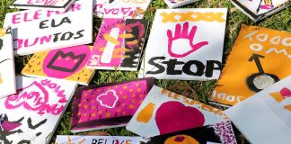 Stop violence against women display of drawings and posters