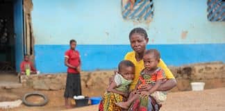 Mother with her children in Komanda, IIIturi-province, DRC. Photo: OCHA/Wassy Kambale