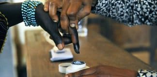 A woman has her finger dipped ink after voting in legislative by-elections in Grand Laho, Côte d′Ivoire (Photo: UN/Hien Macline)