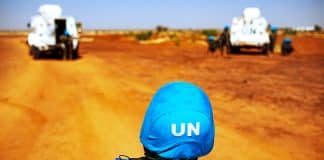 UN Peacekeeper monitoring desert road