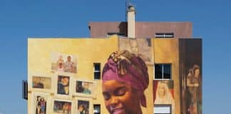 SDG 1 – Eradicate Poverty – portrayed by the hand of artist Jorge Charrua