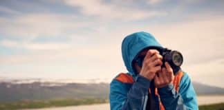 Canva stock photo of a photographer in the wilderness