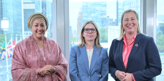 Three women smiling