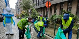 Brussels cleanup 2022 - UN/EU staff and Smurf cleaning the streets