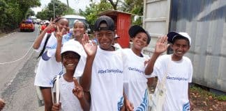 UNDRR and Munich Re Foundation 2025 Risk Awards banner showing children sporitng the #GetToHighGround hashtag