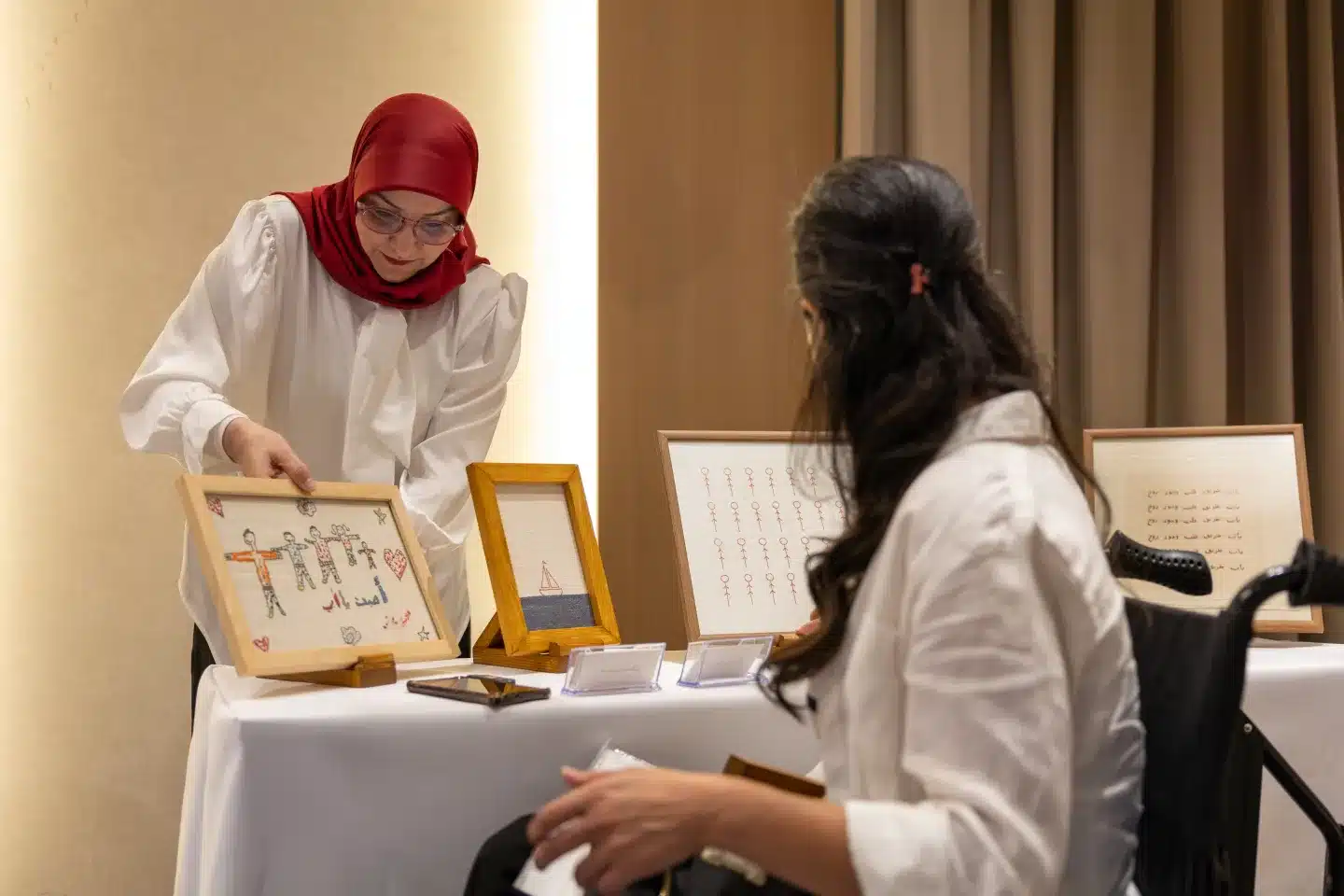 Visitors engage with a participating entrepreneur and explore locally produced items showcased during the exhibition. Beirut, Lebanon 25 September 2026