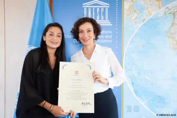 Nadia Nadim var skipuð góðgerðasendiherra UNESCO í viðurkenningaskyn hennar fyrir baráttu fyrir menntun og jafnrétti kynjanna