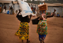 DRC: Displaced people at a distribution point in Ituri in April. Photo: Charlie Musoka