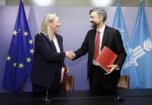Jutta Urpilainen and Alvaro Lario shaking hands