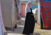 A pregnant displaced woman lives in a tent inside the Deir al-Balah camps. Credits: UNFPA