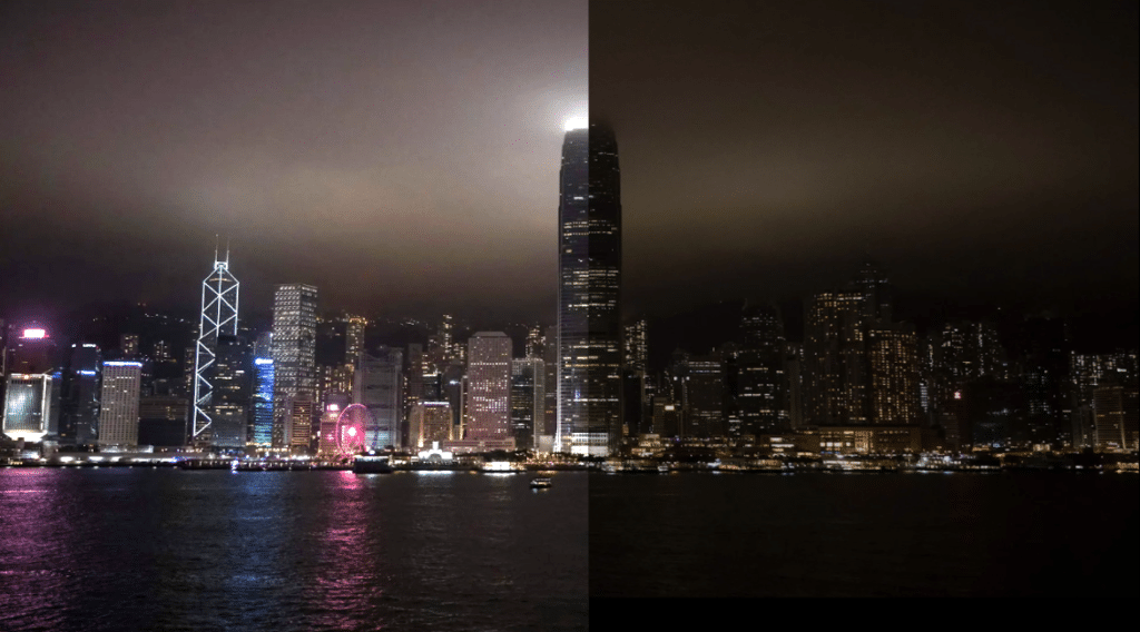 skyline halva är tänd och halva är släckt under earth hour